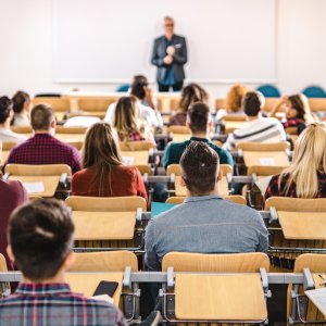 Young scientist giving lecture